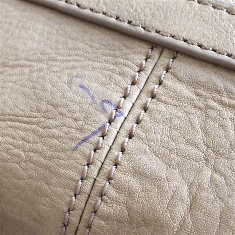 how to get pen mark off michael kors bag|remove pen marks from leather.